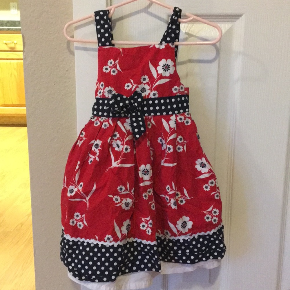 Red, black and white dress. Well made.